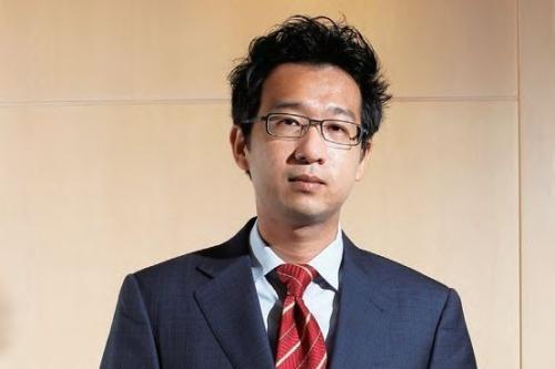 洪灏，在周期的风暴眼里，做一个冷静的叙事者